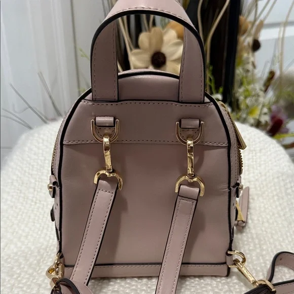 Michael Kors Blush Star-Patterned Mini Backpack - Picture 2 of 10